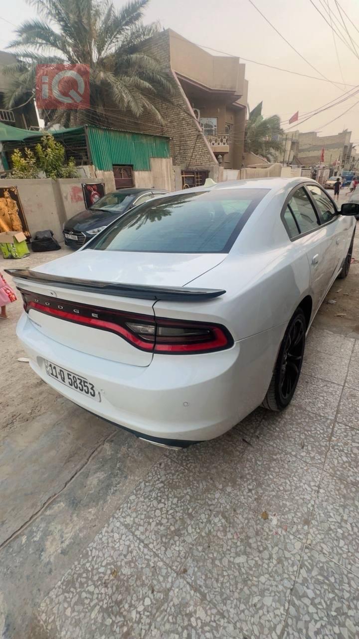 دۆج چارجەر